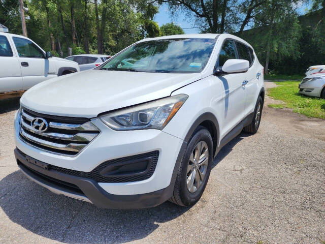 hyundai santa fe 2014 5XYZTDLB5EG146527 image hyundai santa fe 2014 5XYZTDLB5EG146527 image